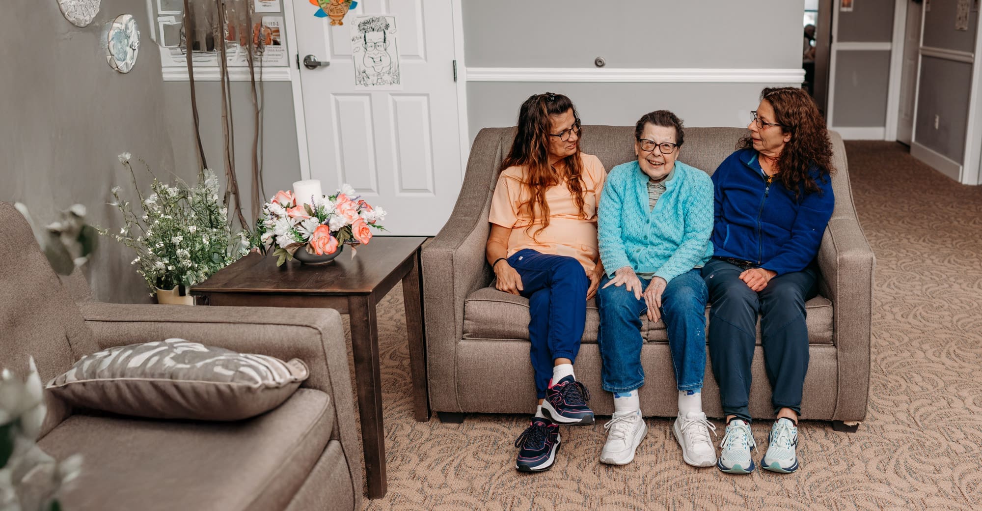 two nurses sitting on chair